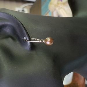 Brown culture dangling pearl earrings